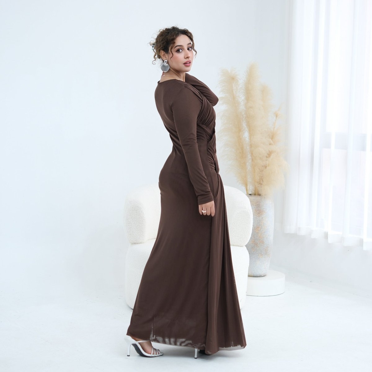 Model wearing modest party maxi dress at floor length, front-facing