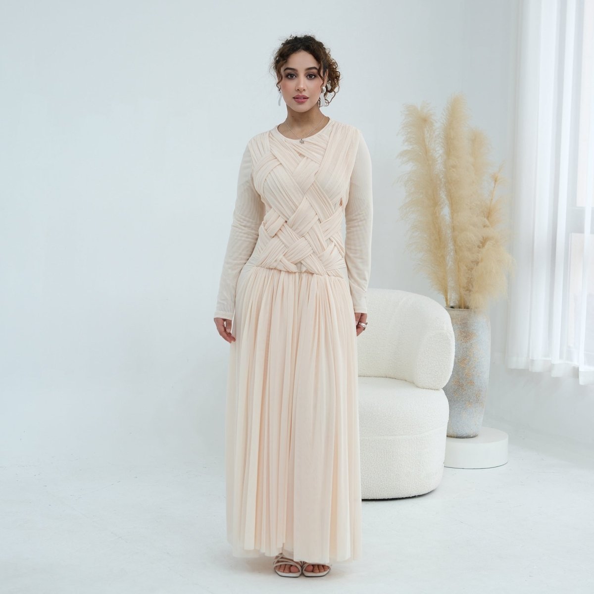Model in modest party maxi dress showing skirt movement from waist down