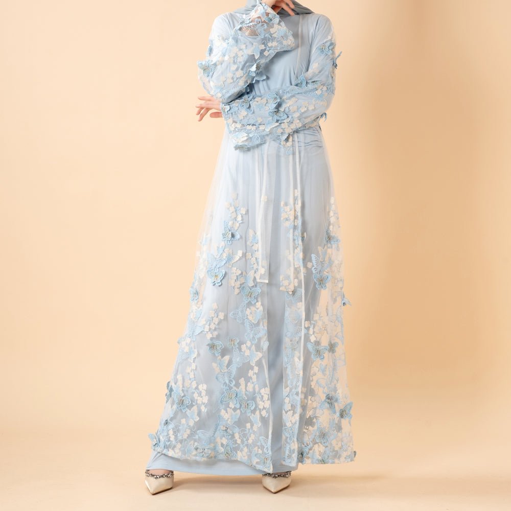 Side profile of the butterfly embroidered open abaya with self-tie belt