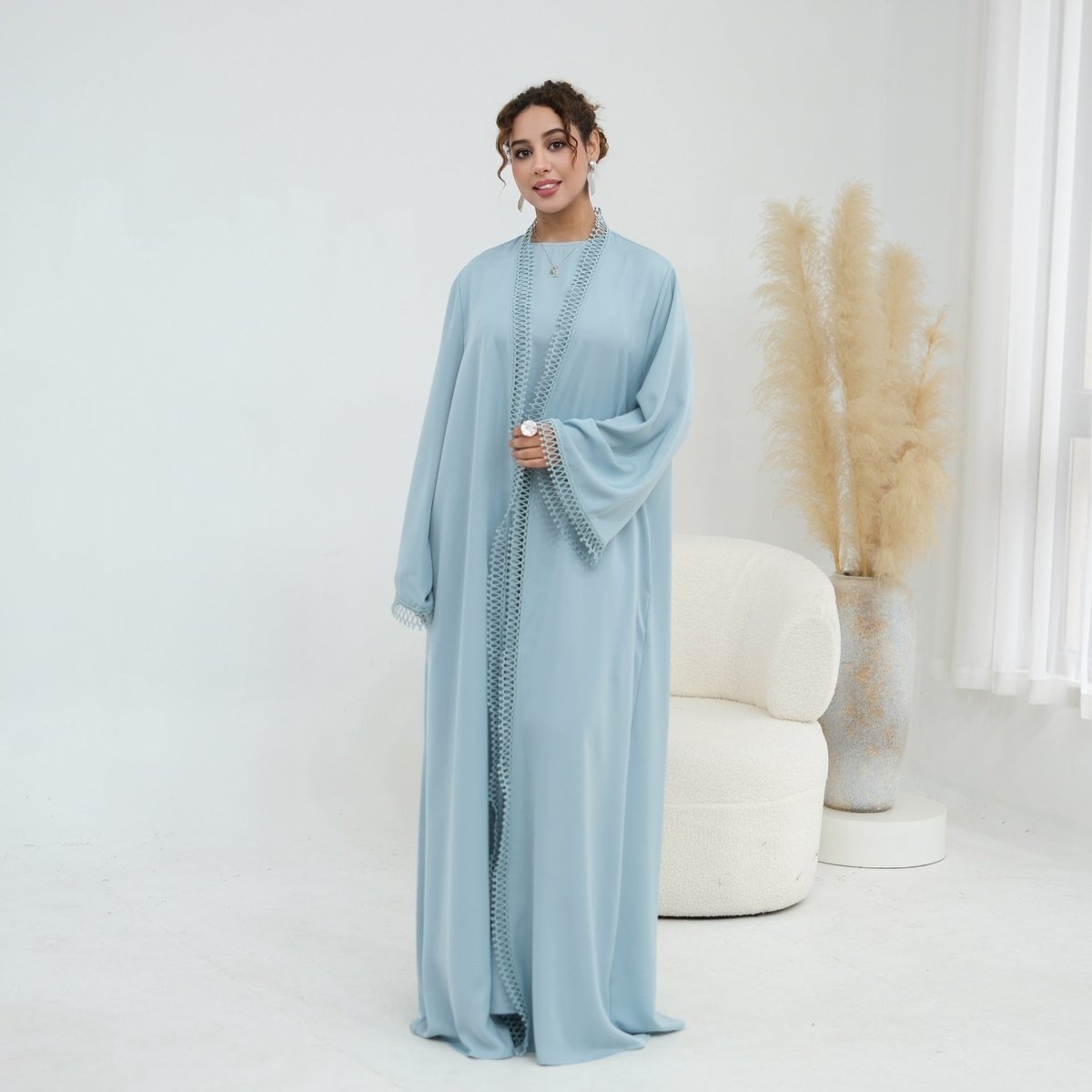 Overhead drape detail of matte opaque abaya fabric