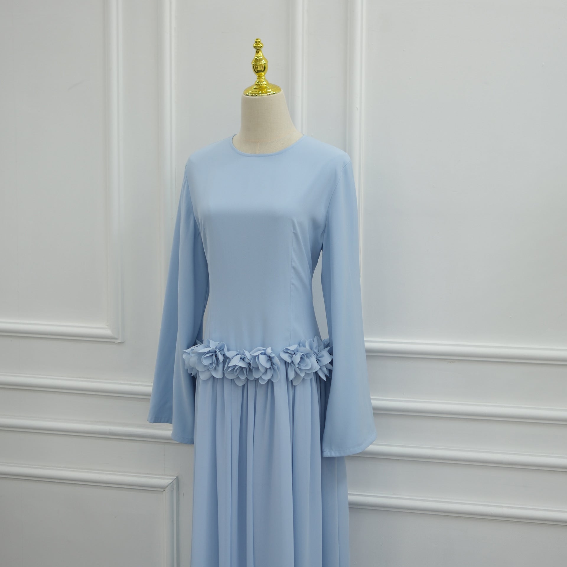 Full-length front view of fitted 3D rose maxi dress in ivory
