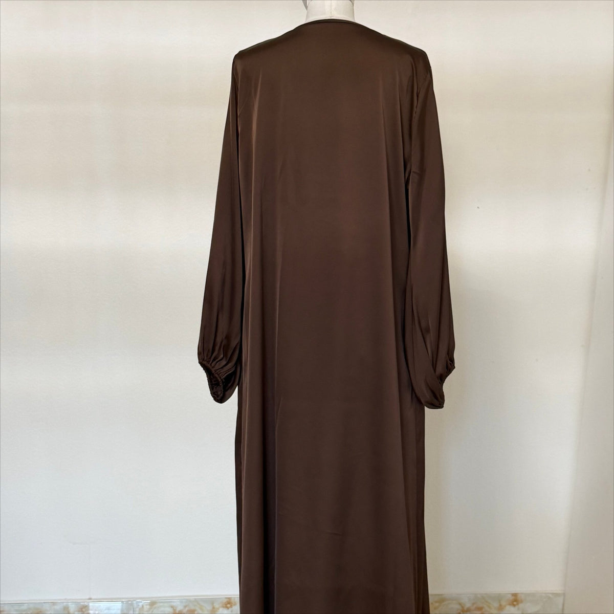 Full-length view of three-piece archive abaya ensemble