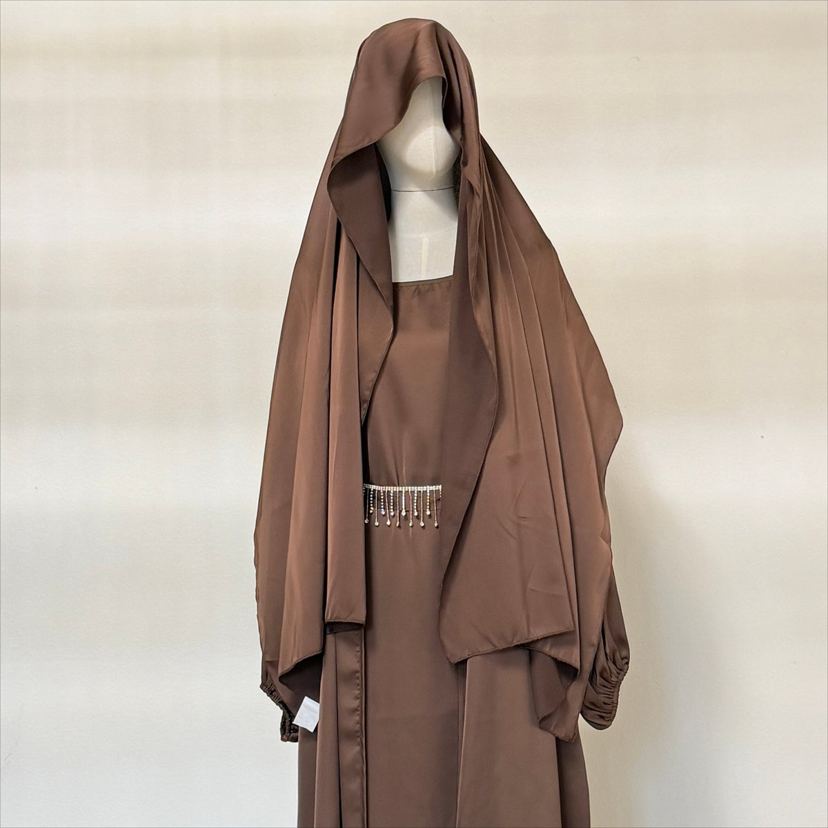 Rhinestone fringe belt detail on satin abaya set