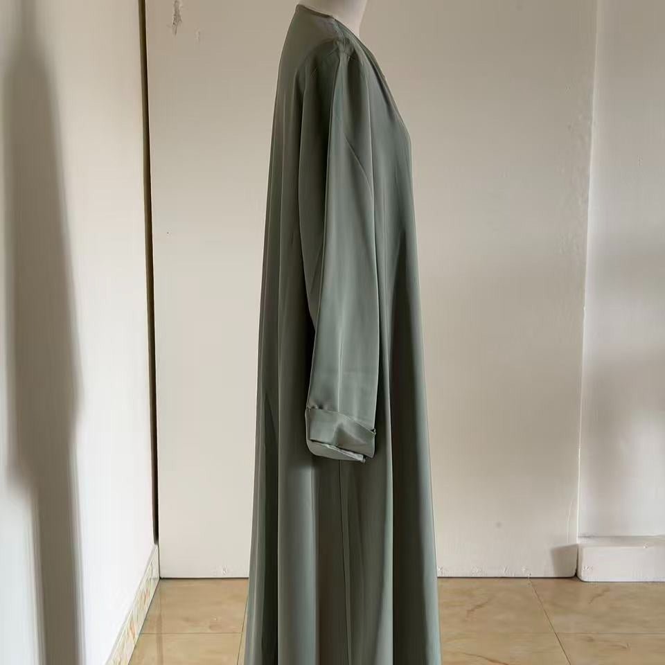 Full-length view of minimalist V-neckline fluid robe in solid colour
