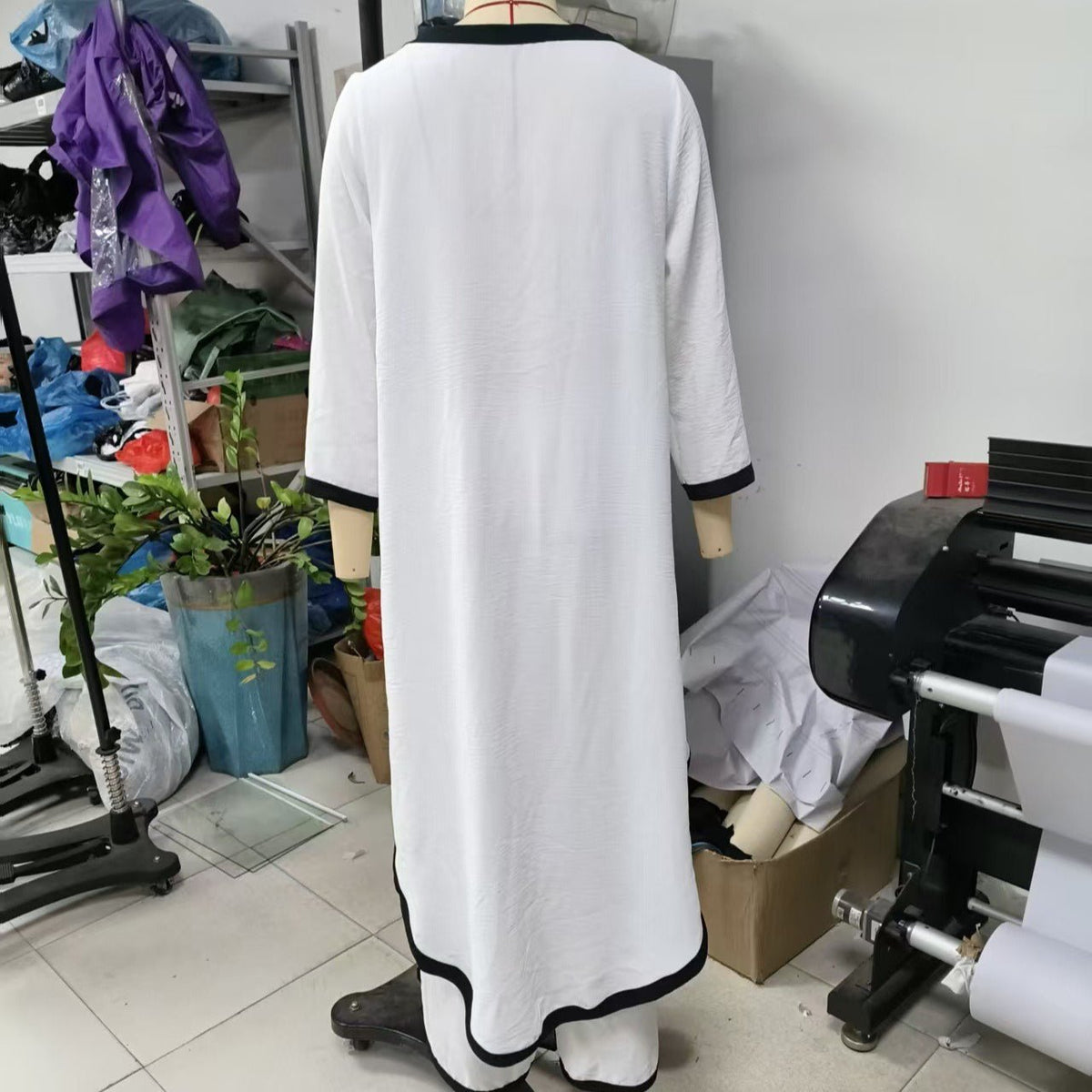 Back view of two-piece co-ord set with longest hem sweep