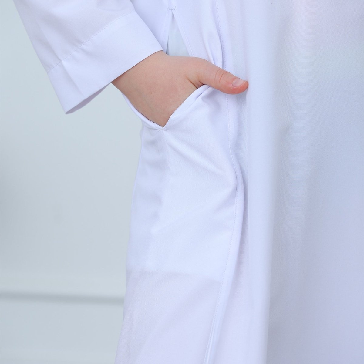 Mandarin stand collar detail on classic kids white thobe
