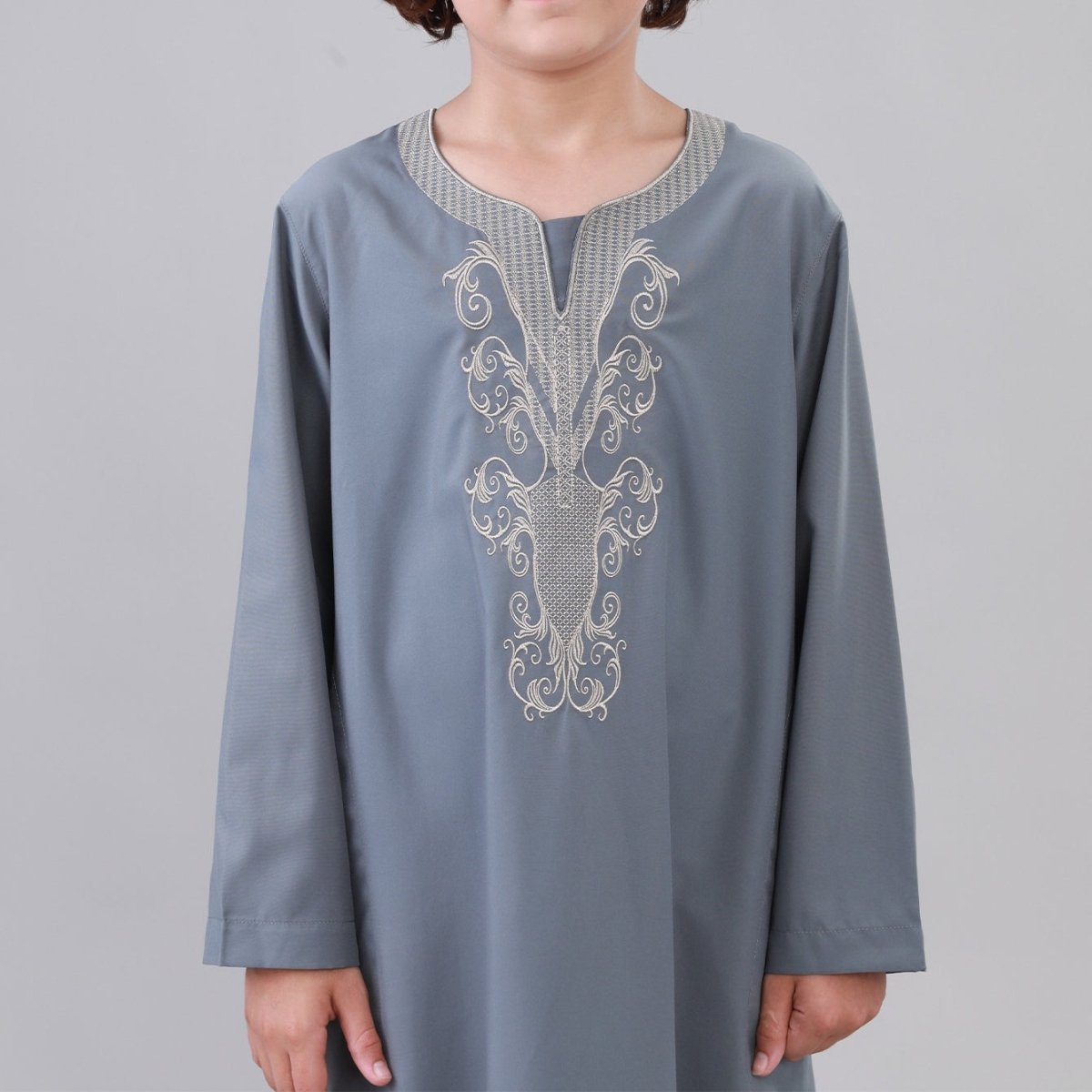 Full-length front view of boys' embroidered Eid thobe in cream