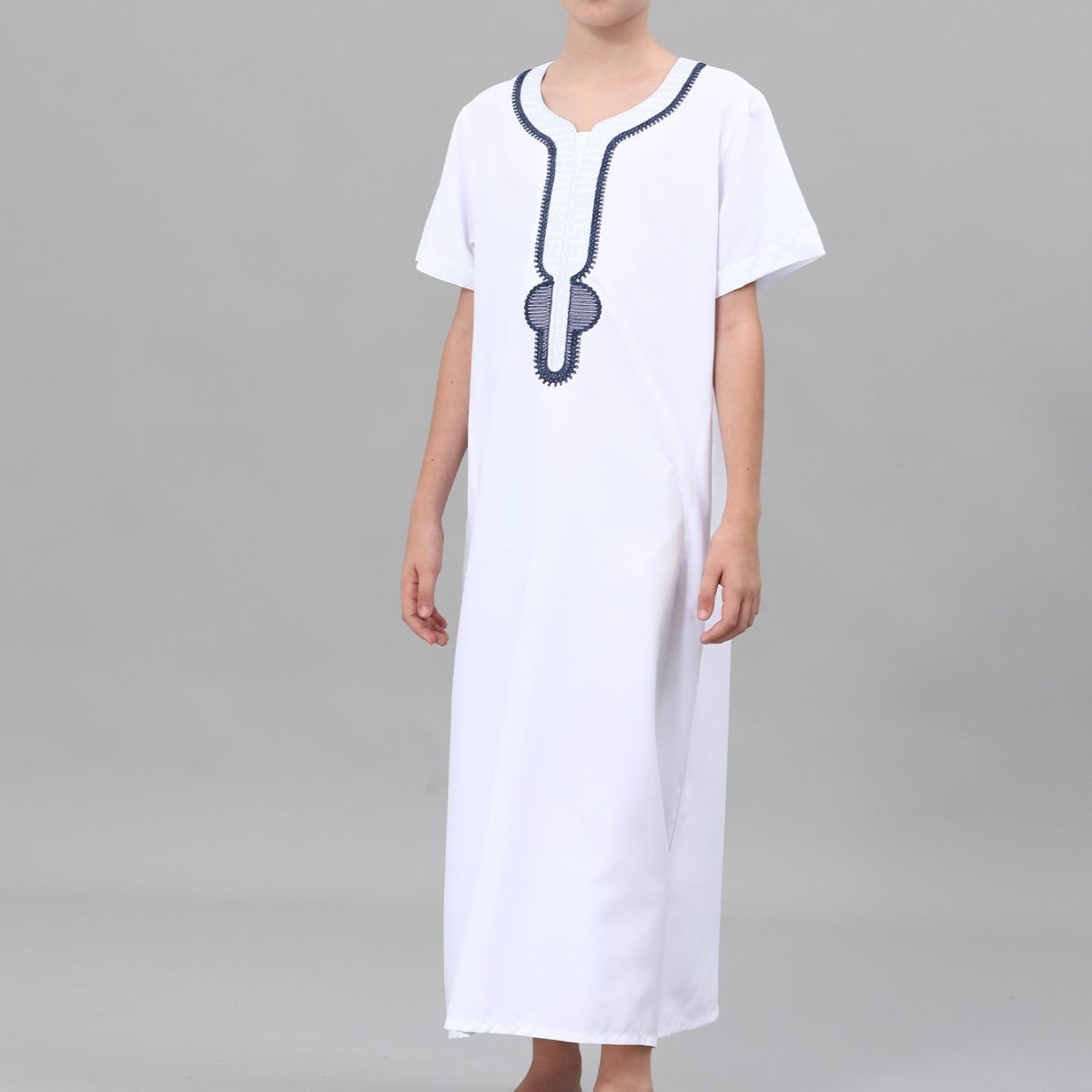 Back view of ankle-length boys' embroidered thobe in white
