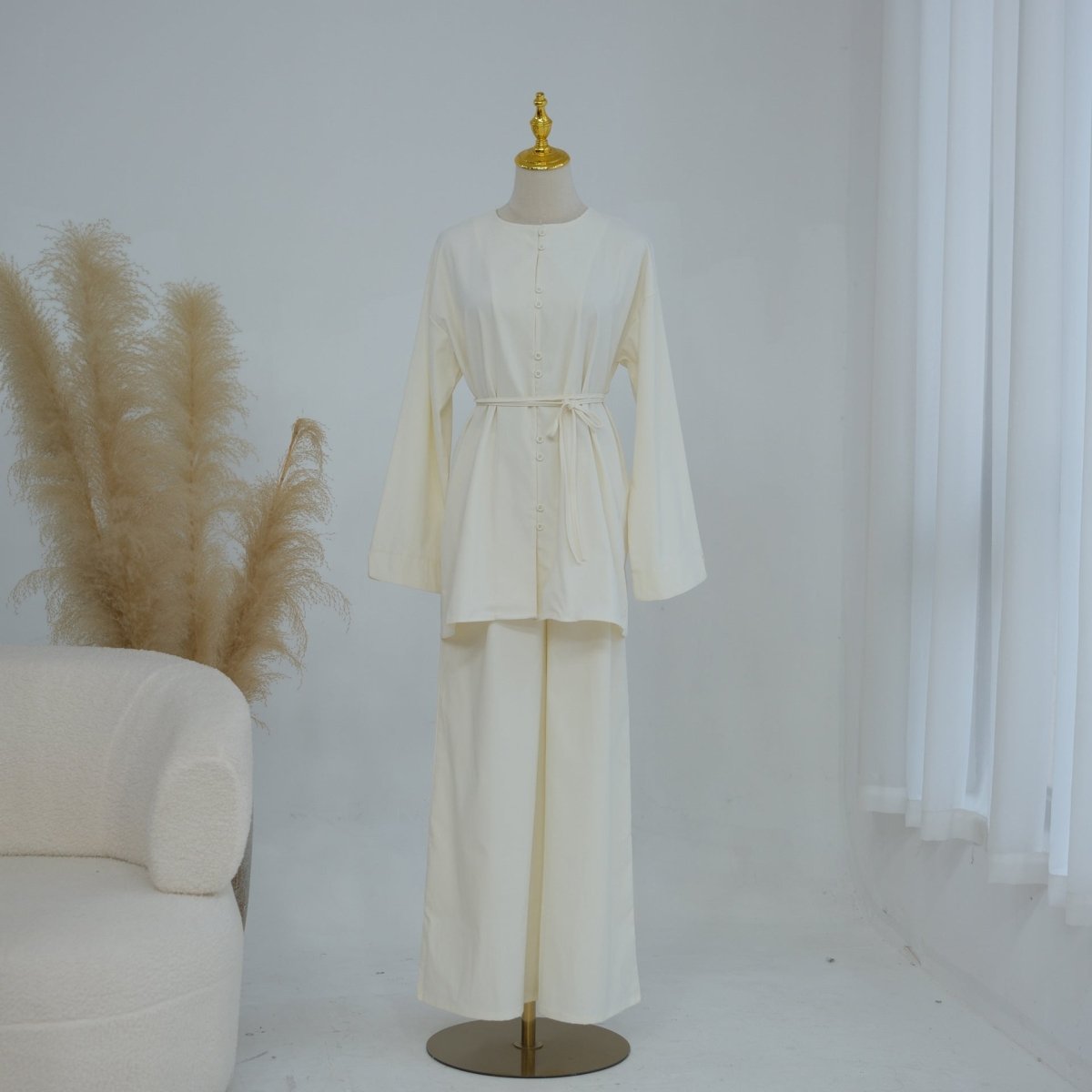 Full-length trouser hem showing floor-length coverage on co-ord set