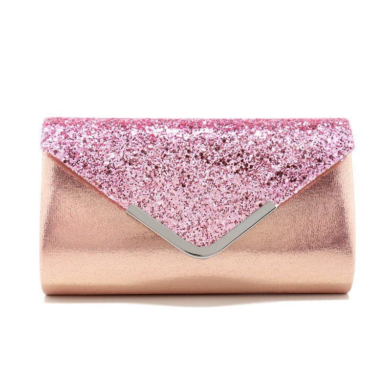 Styled hand-held clutch look for wedding guest outfit