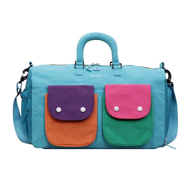 Vibrant color-blocked fabric detail on lightweight travel duffel bag