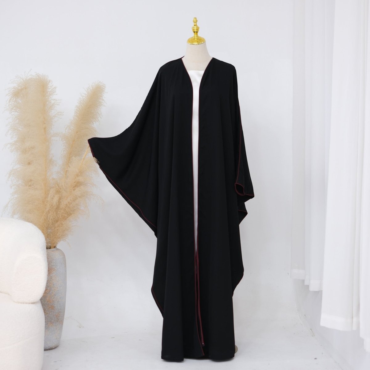 Side view of third colourway open abaya with floor-length coverage