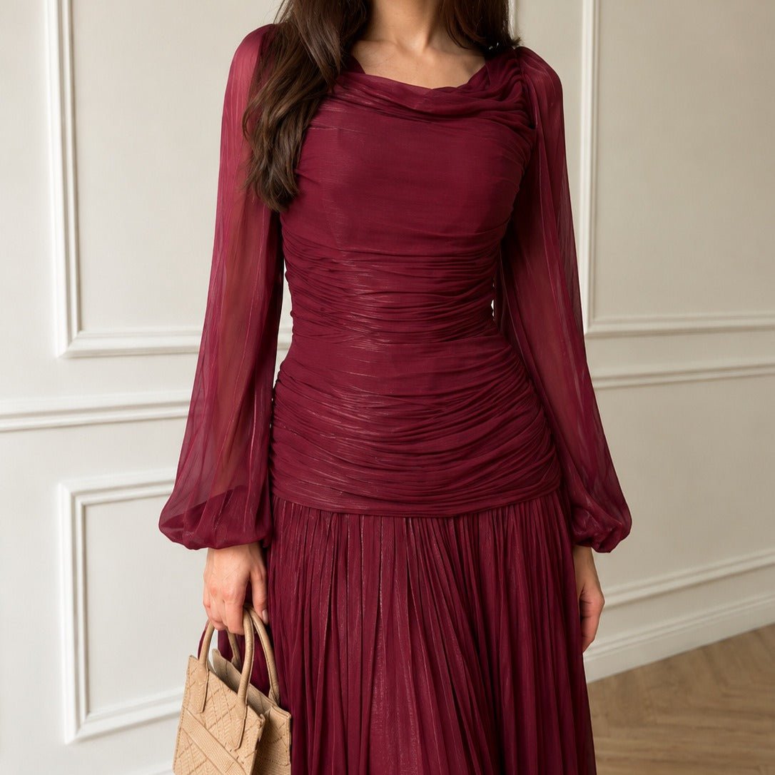 Close-up of self-tie ribbon bow at wrist of lantern sleeve modest formal dress