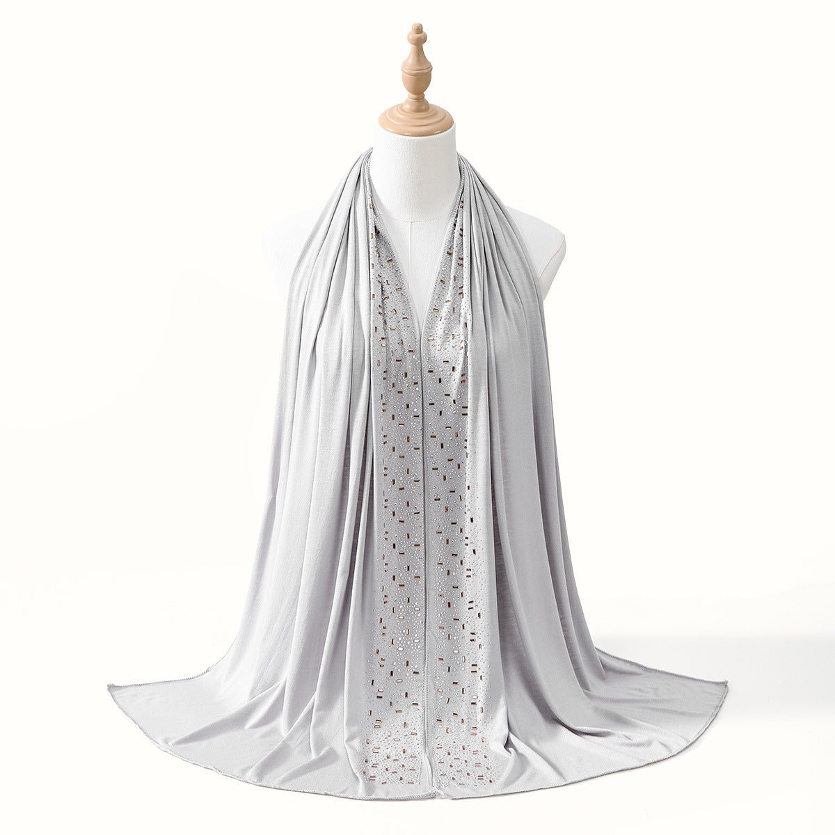Side drape of crystal rhinestone hijab showing clean plain hem on short end