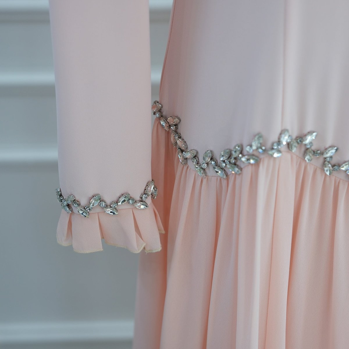 Ruffle cuff layered wrist finish close-up