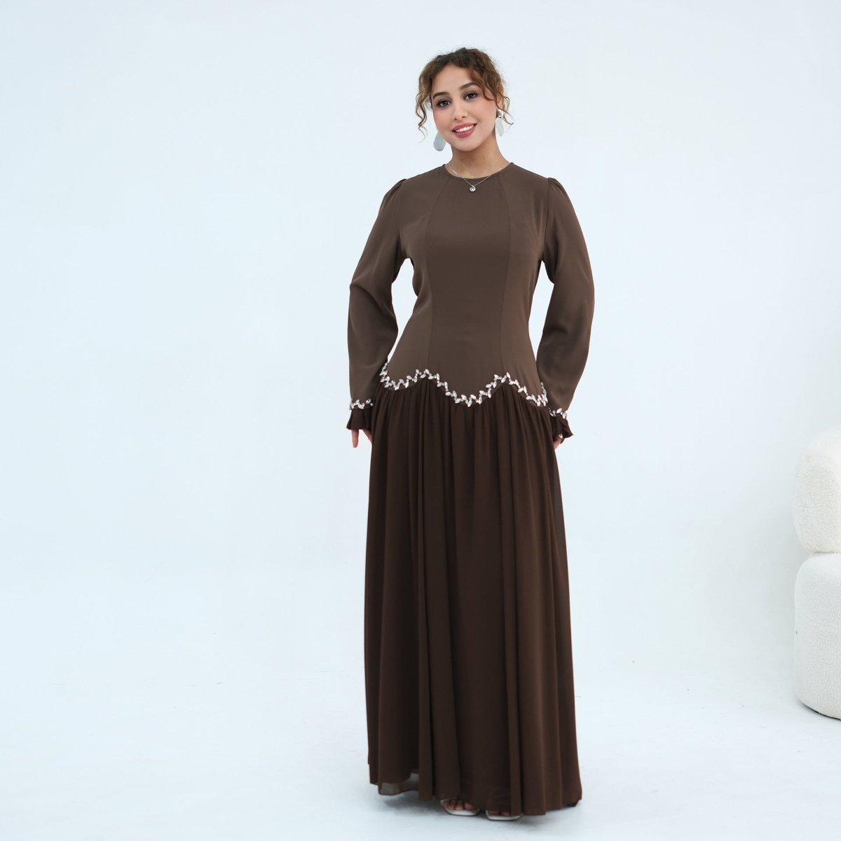 Puff shoulder detail and round modest neckline
