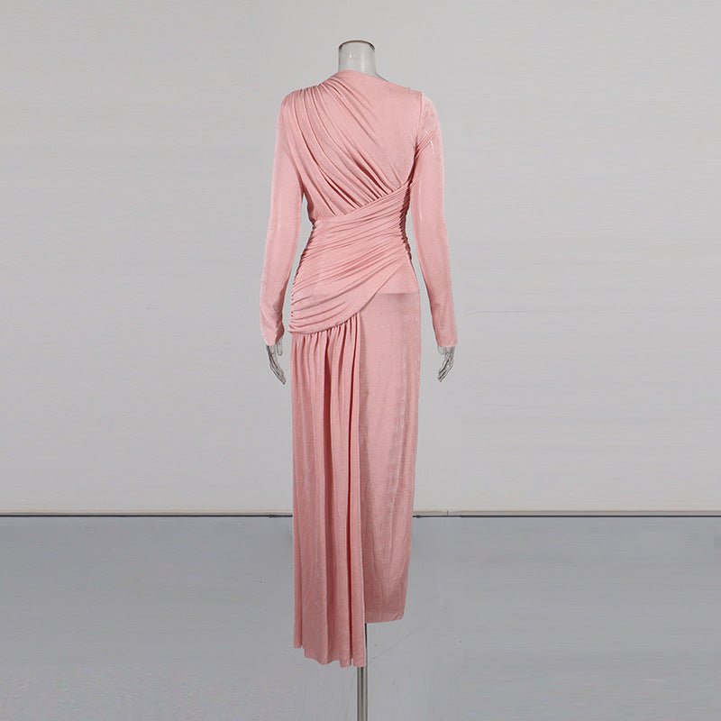 Close-up of sculptural diagonal ruche twist at the waist of the bodycon dress