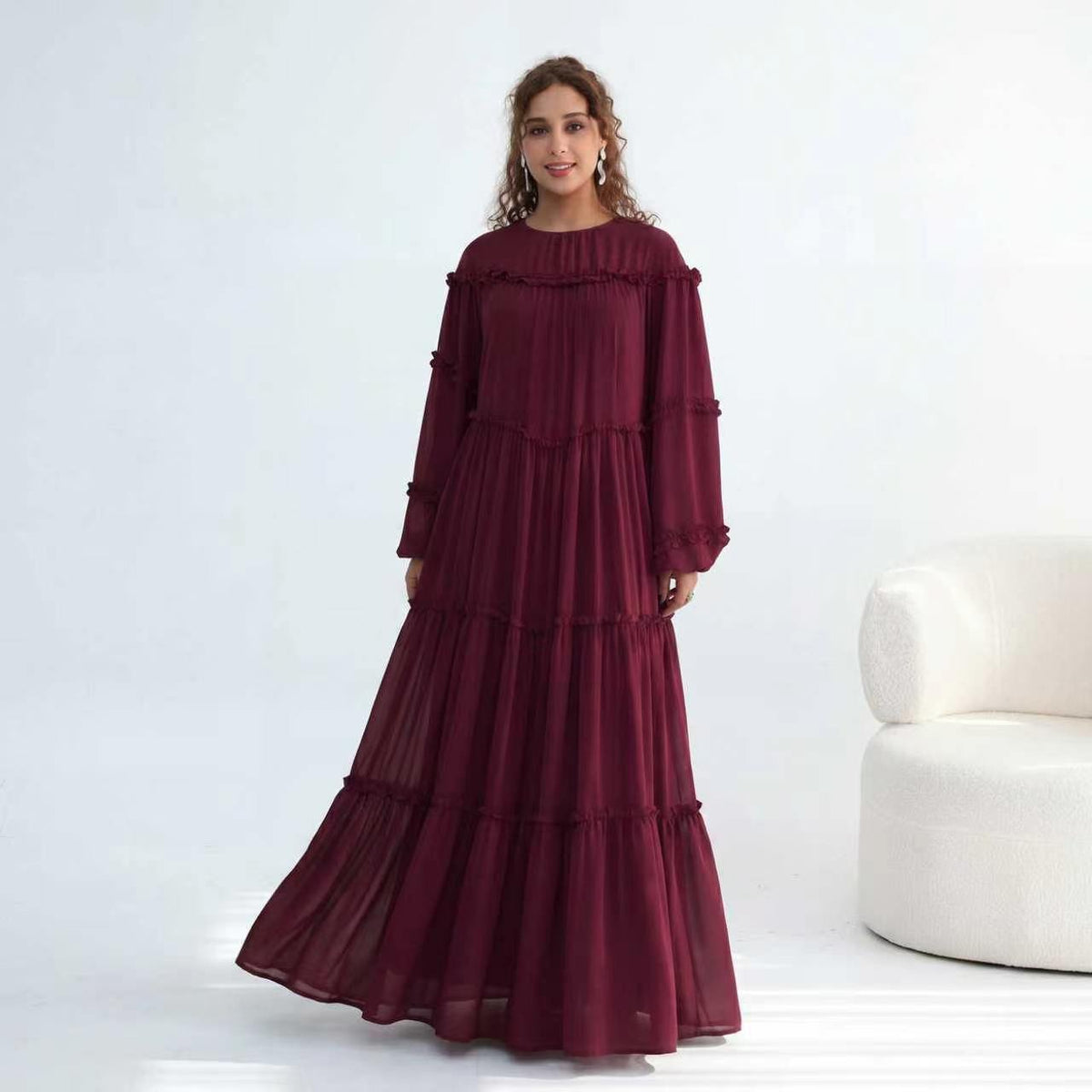 Modest ruffle maxi dress shown in movement showcasing flowing silhouette