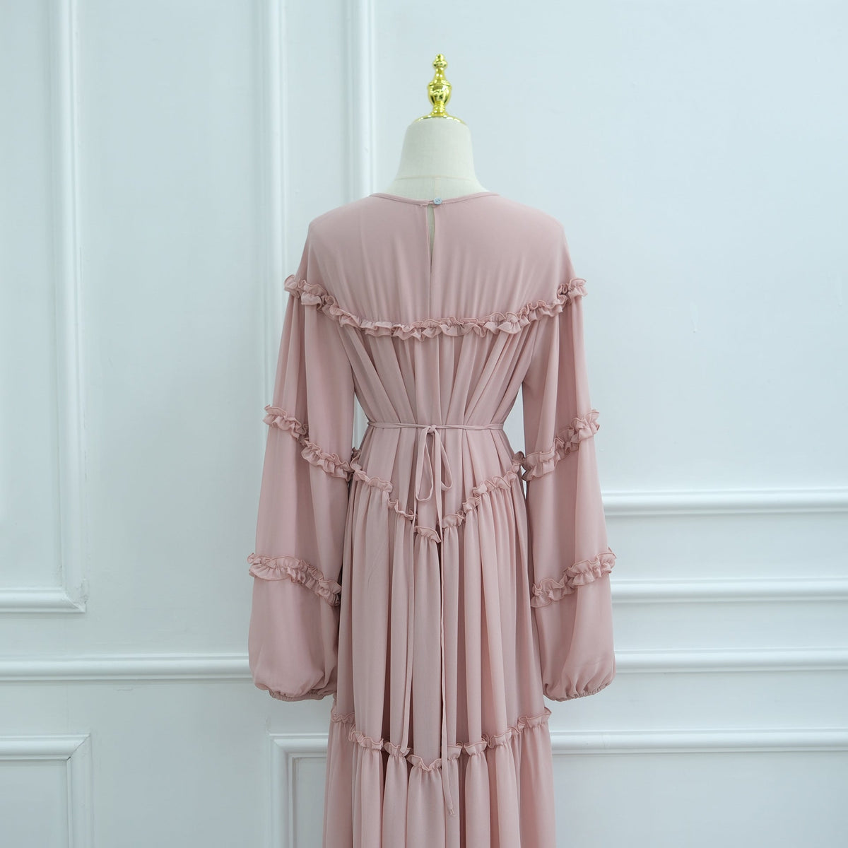 Full-length front view of layered modest maxi dress in relaxed fit