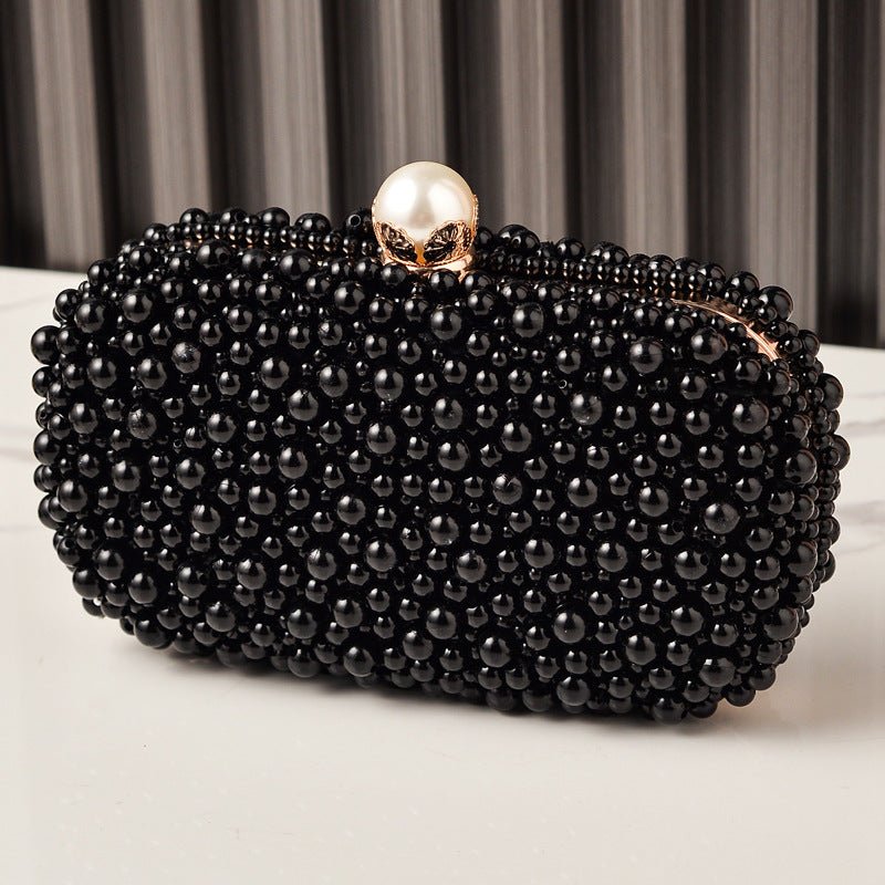 Interior view of pearl clutch bag showing soft fabric lining and storage capacity