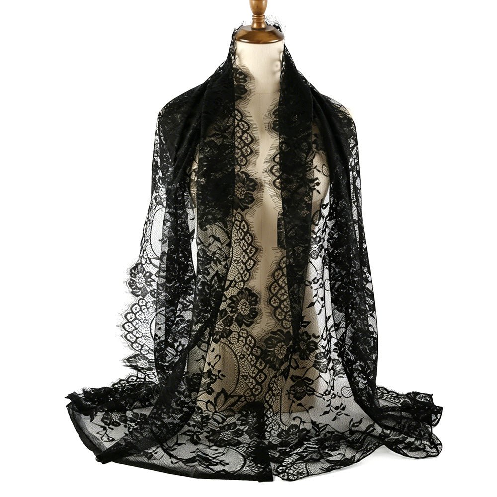 Side drape view of floral lace hijab showing varying mesh density