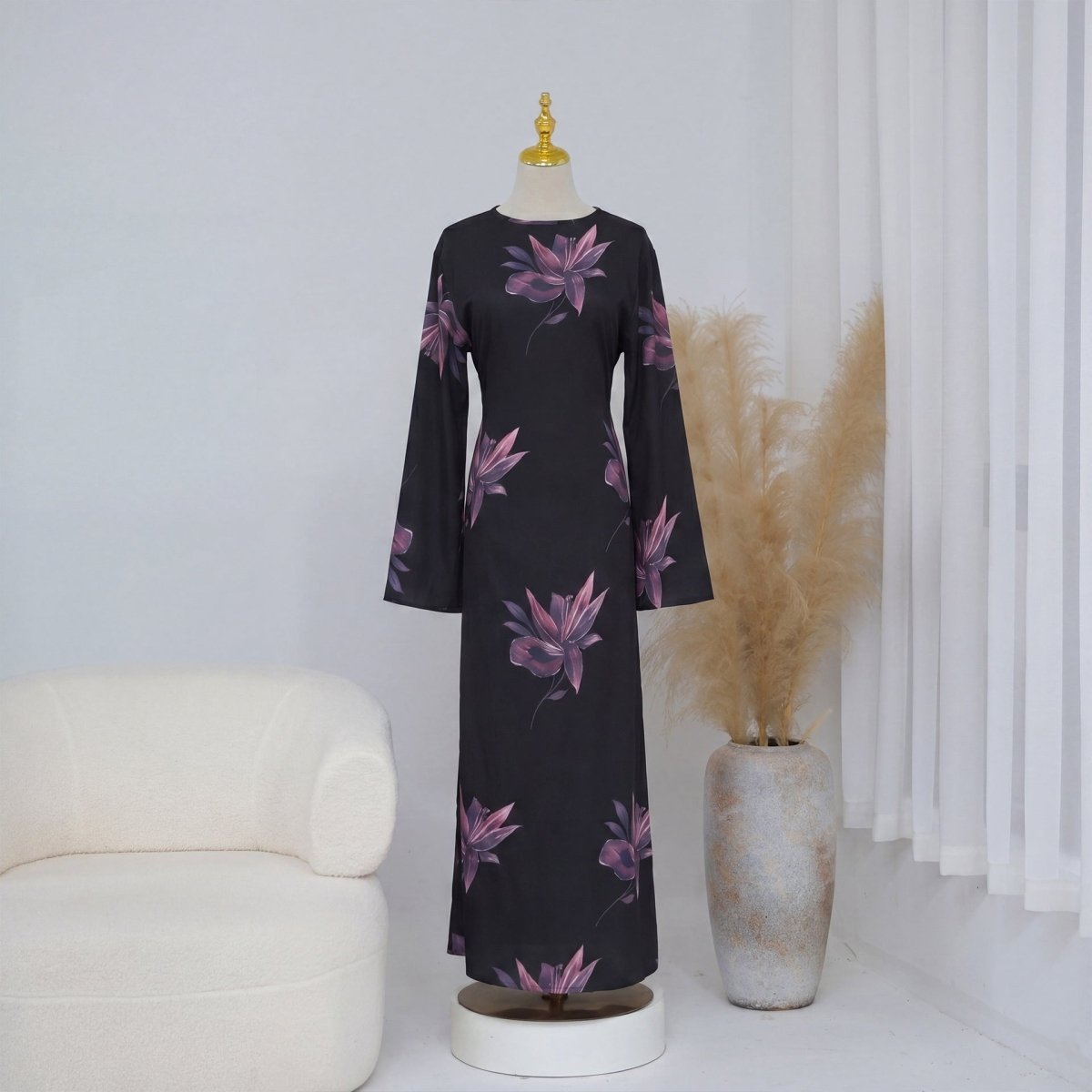 Styled outfit shot of cape sleeve floral maxi dress in natural light
