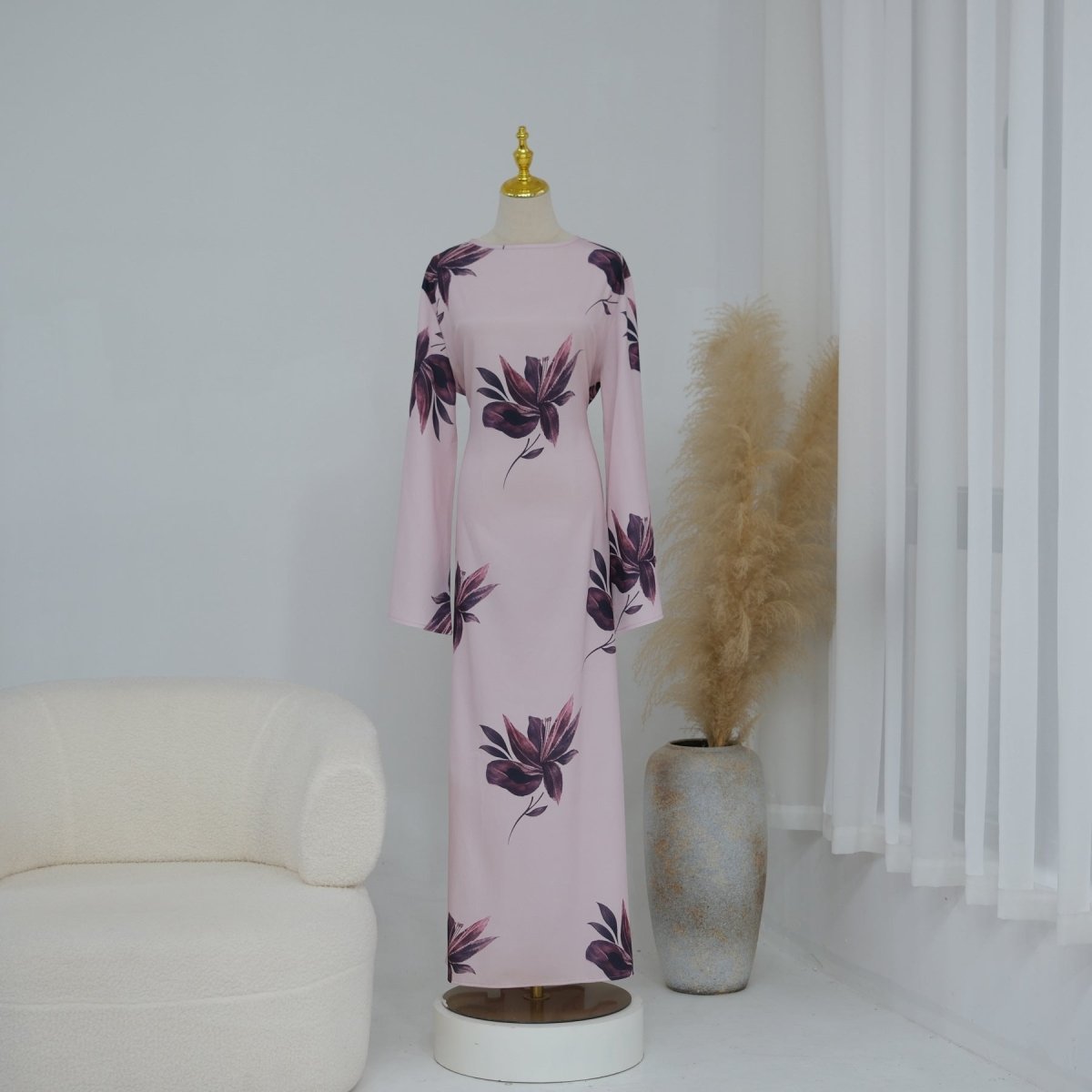 Detail of hidden back zip from neckline to hem on floral print maxi