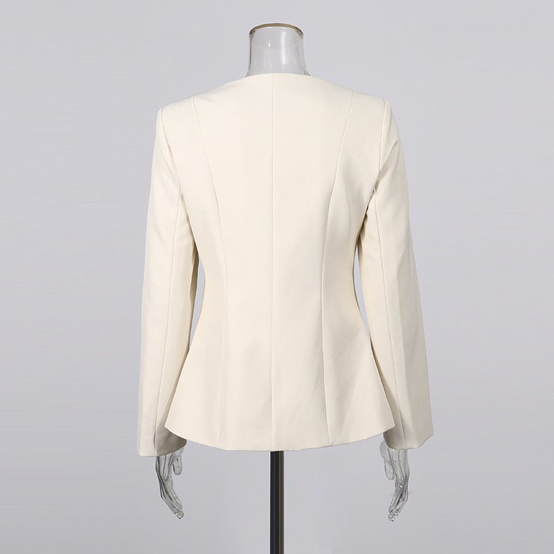 Apricot tailored blazer and pants ensemble with sophisticated styling
