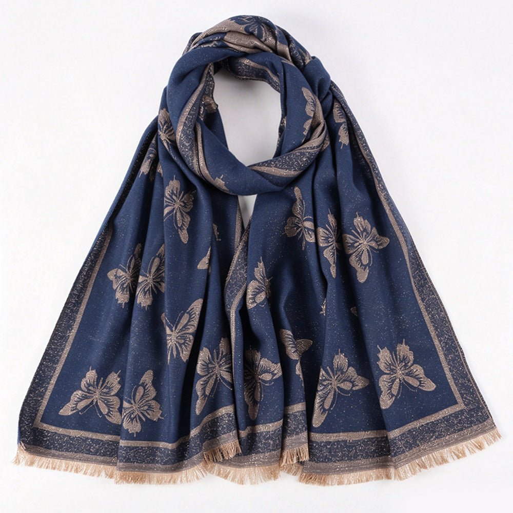 Gold-thread hijab styled as a head wrap with tassel fringe