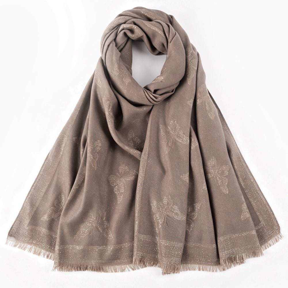 Jacquard hijab draped as a shoulder shawl over plain abaya