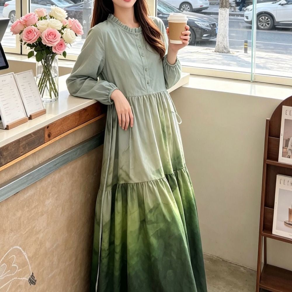 Tiered ruffle skirt detail on hand-dyed gradient maxi dress