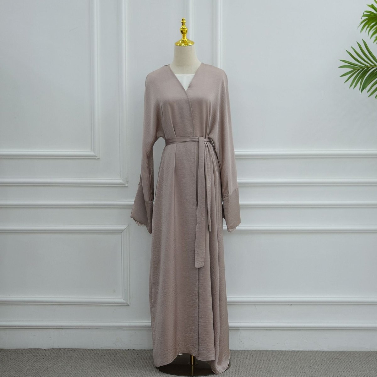 V-open neckline detail on crinkle open abaya