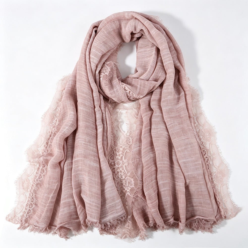 Beige lace trim hijab styled as a classic wrap
