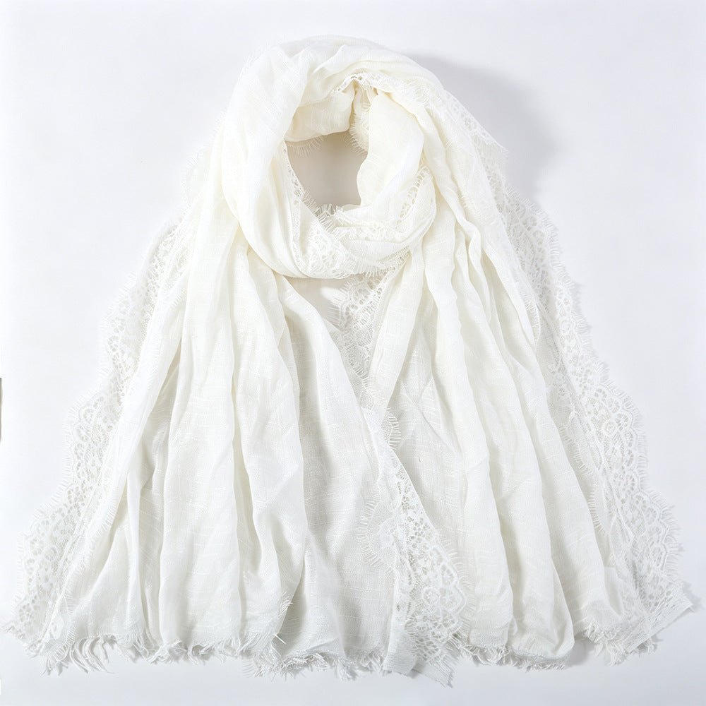 Soft pink lace edge hijab draped over the shoulder