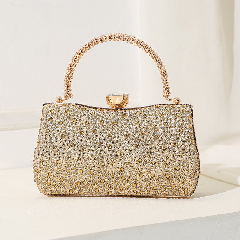 Interior slip pocket of structured evening clutch bag