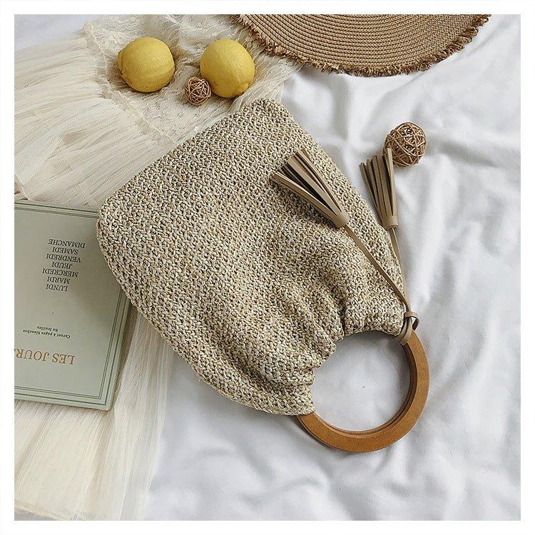 MAC132 Fashionable Straw Simple Beach Tassel Bucket Bag - Mariam's Collection