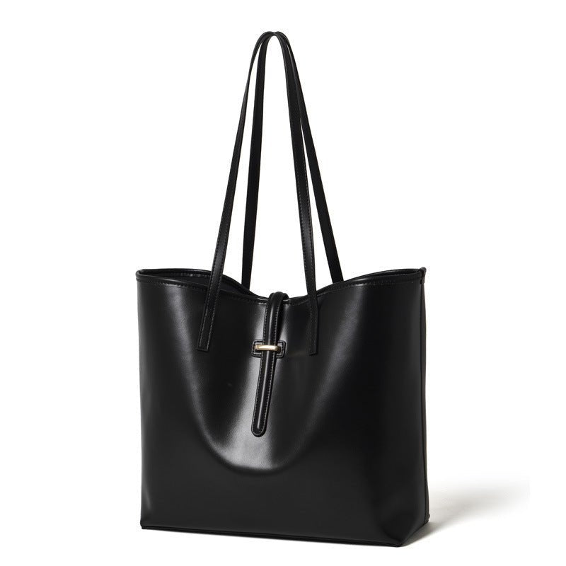 Matching removable inner pouch laid flat beside main minimalist tote bag