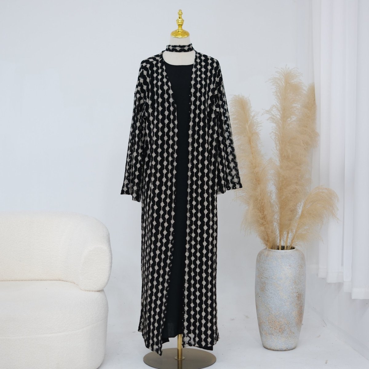 Lightweight lace abaya modelled outdoors in spring setting