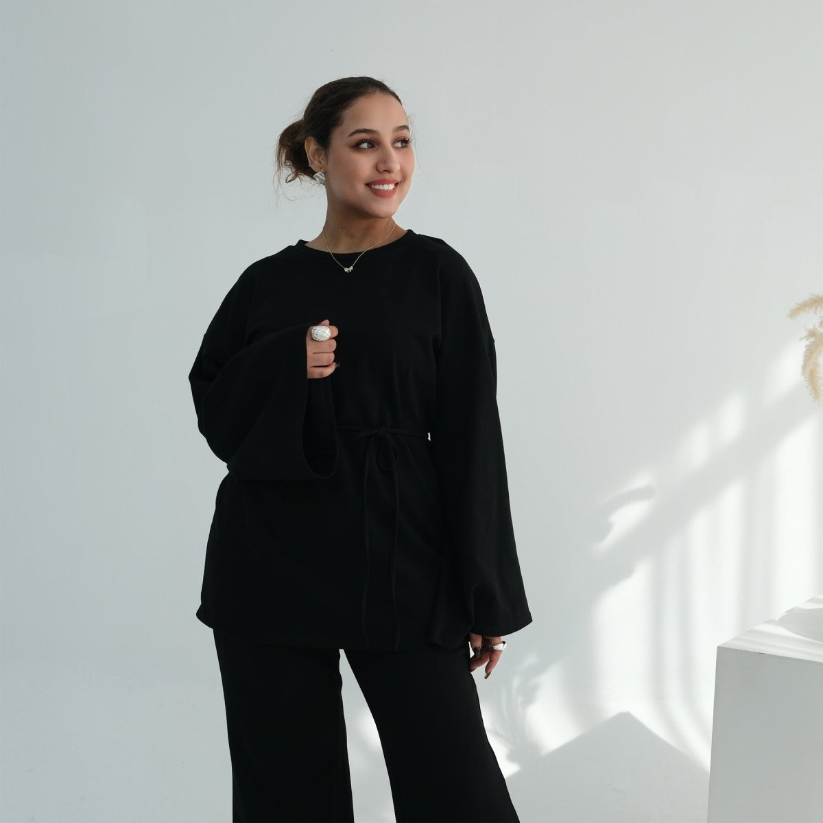 Relaxed batwing sleeves draped naturally on cotton modest set
