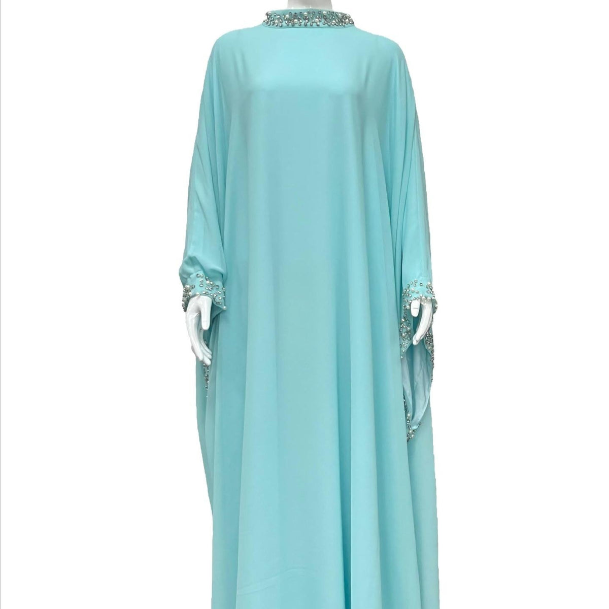 Full-length front view of pearl crystal embellished maxi abaya dress