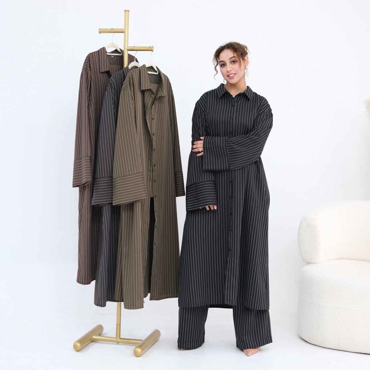 Wide-leg pinstripe trousers with elasticated waistband and deep side pockets