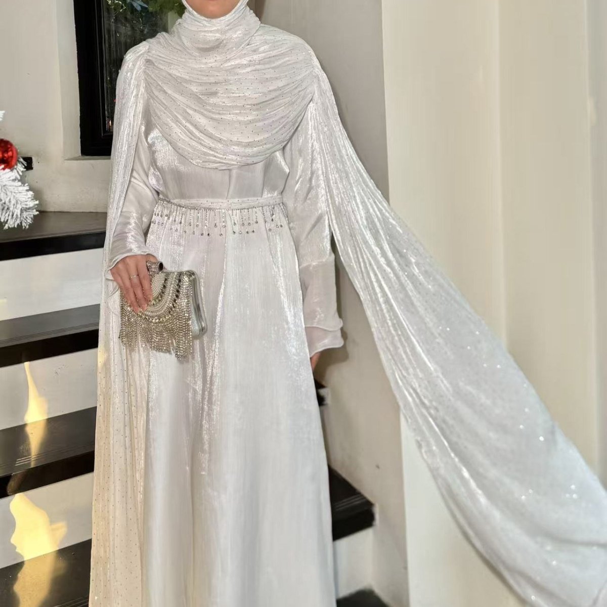 Sweeping floor-length cape sleeves on occasion abaya dress