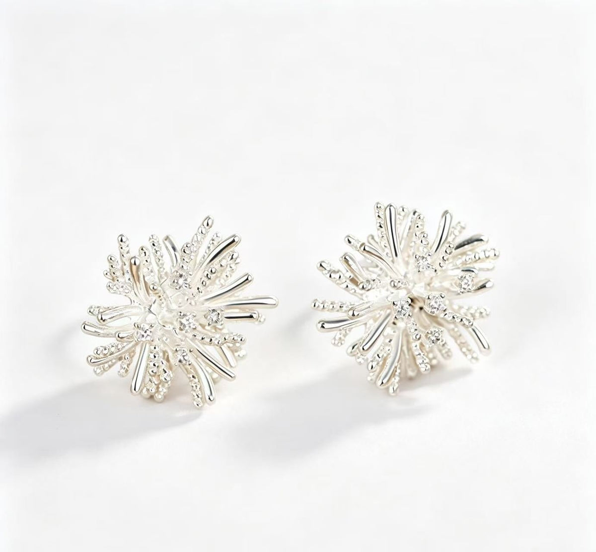 Crystal stud earrings styled with an elegant modest evening look