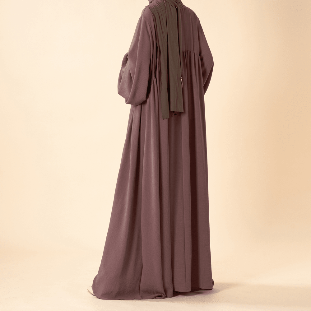 Close-up of crepe fabric drape on newest abaya variant