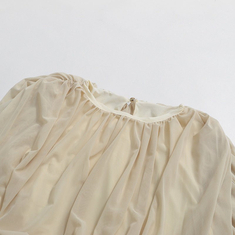 Elasticated waist detail on modest floor-length dress