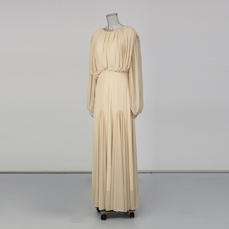 Voluminous lantern sleeve with elasticated cuff detail