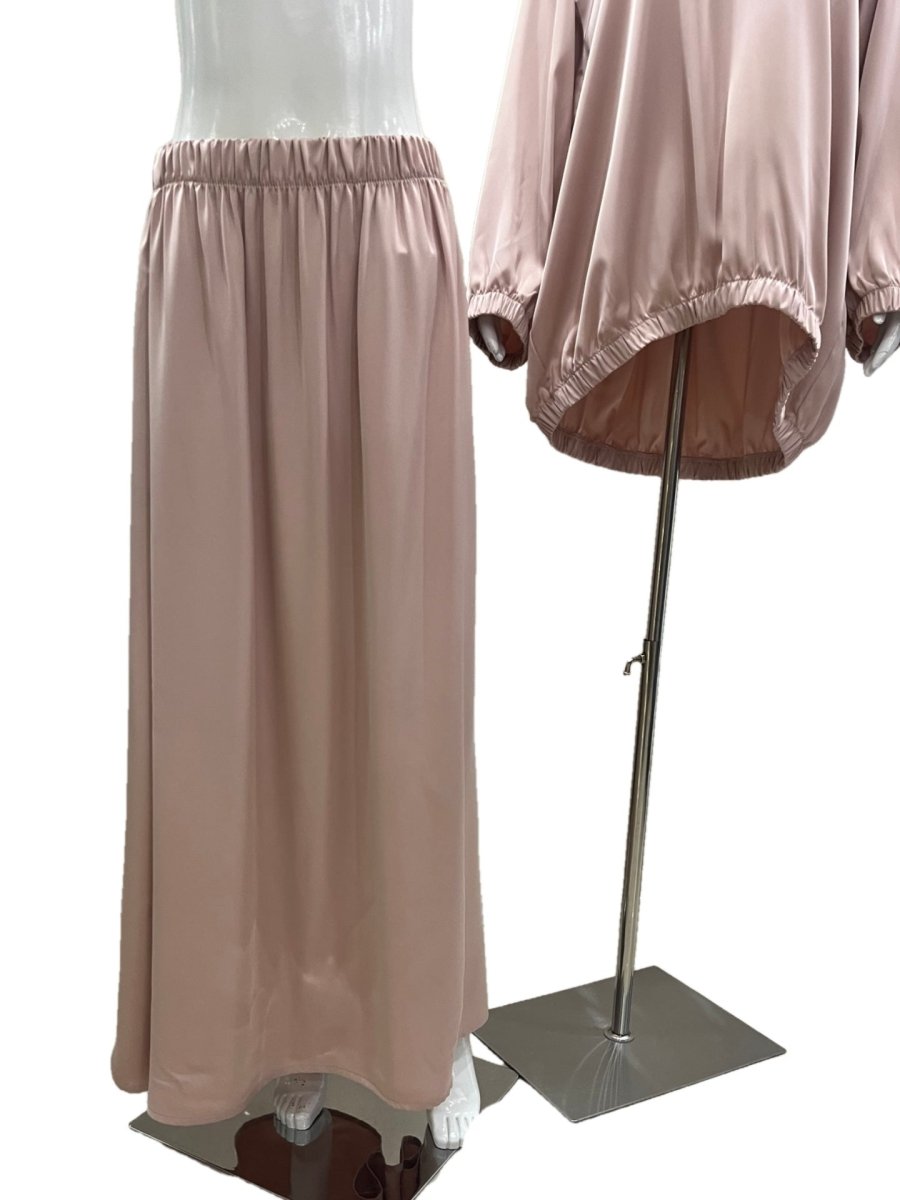 Back view of satin hooded two-piece set showing relaxed silhouette