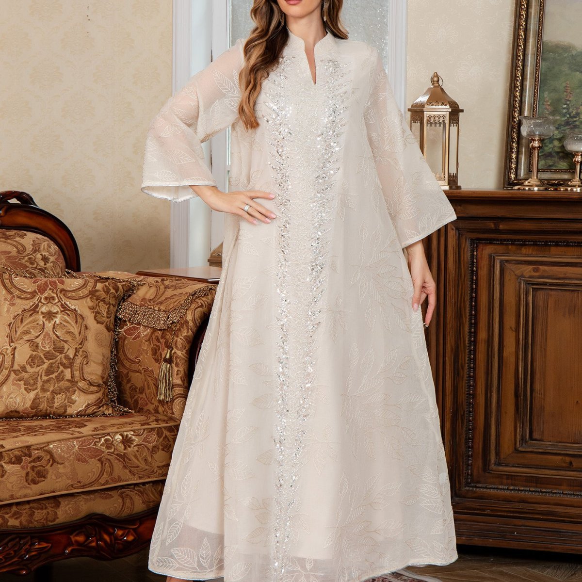 Sequin embroidered mesh abaya in apricot with sparkling sequin detail