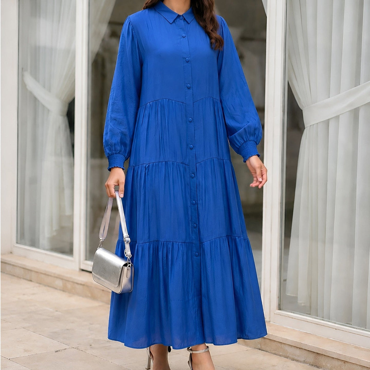Side profile showing voluminous three-tier skirt silhouette
