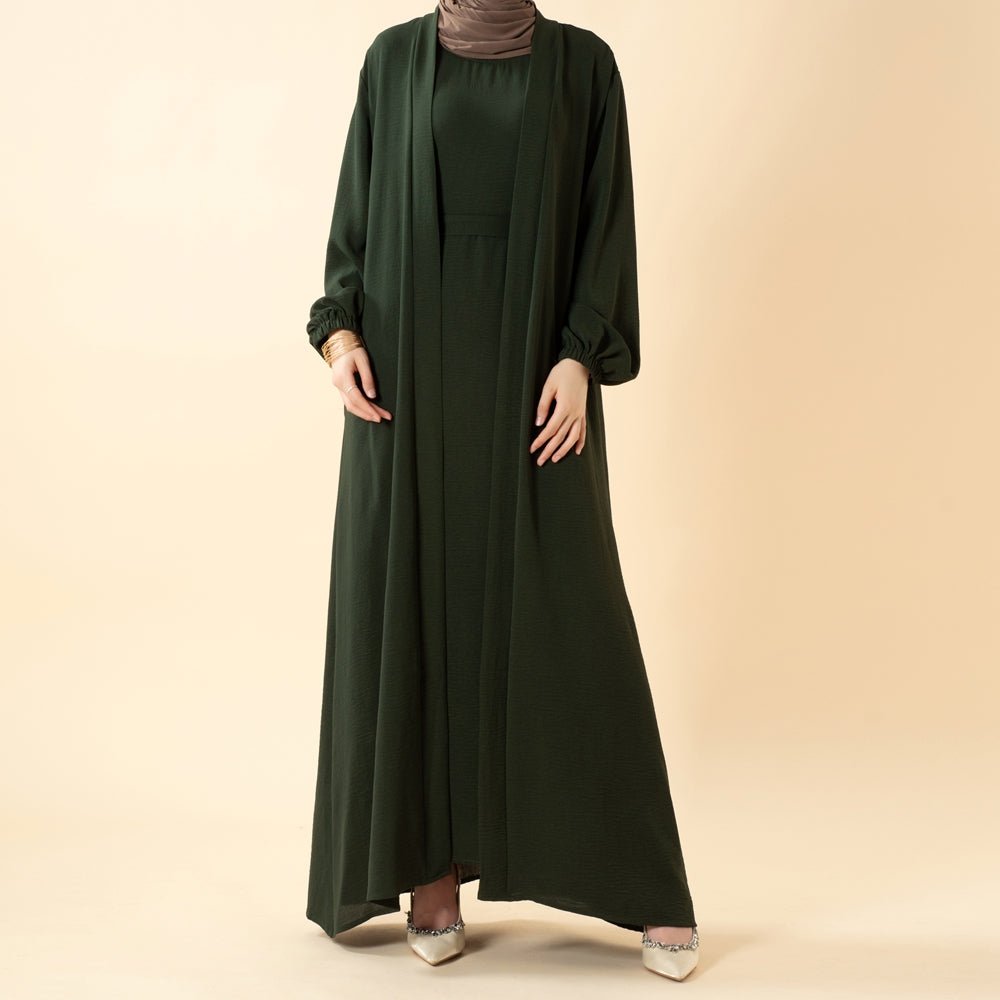 Back view of the solid colour open abaya showing full-length coverage